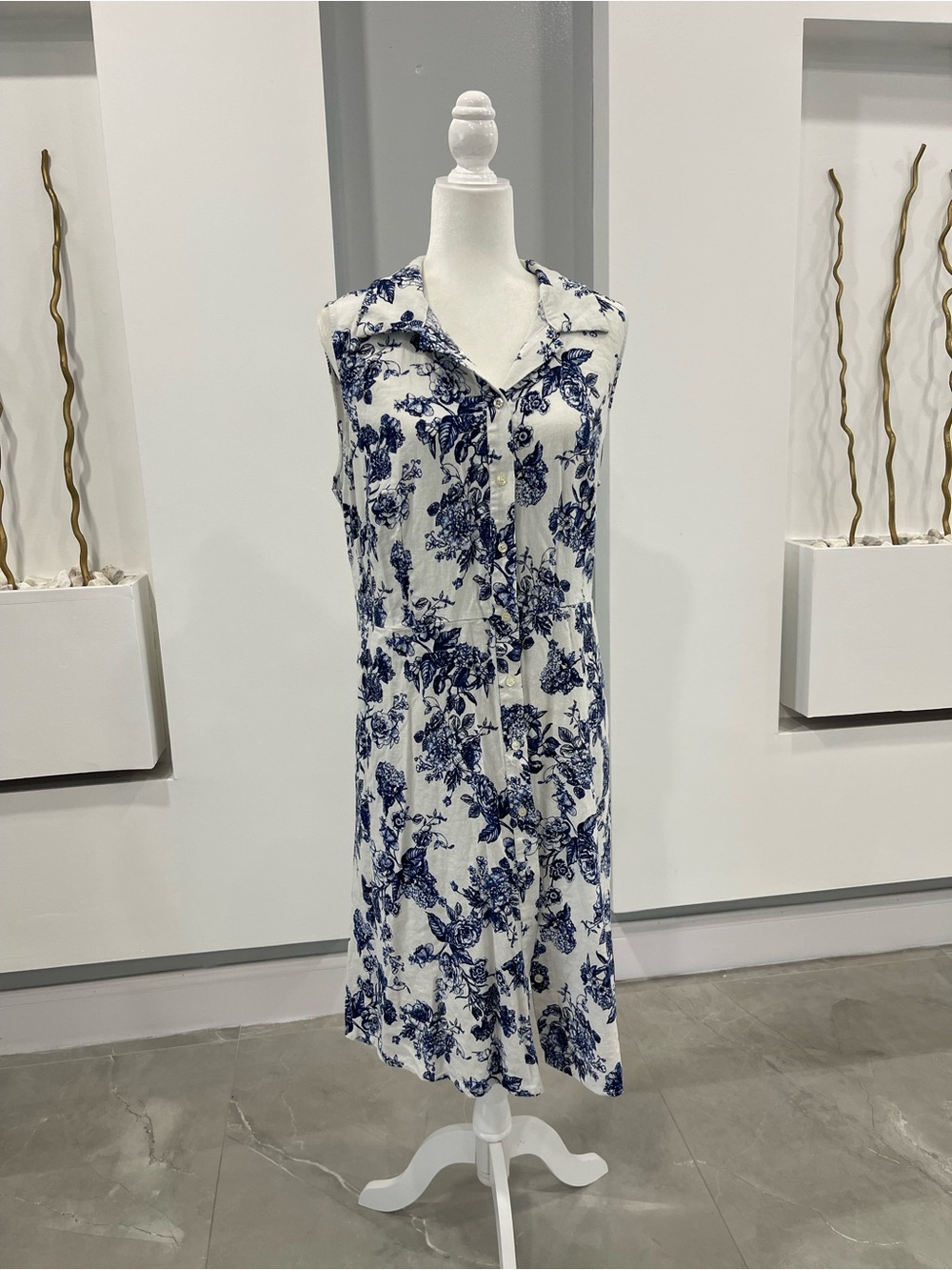 Sleeveless White Midi Dress with Navy Floral Print